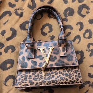 Leopard Print Top-Handle Mini Bag with Gold V Accent And Tassel
